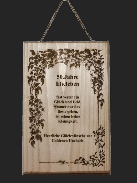 Bild mit Text auf Holzplatte